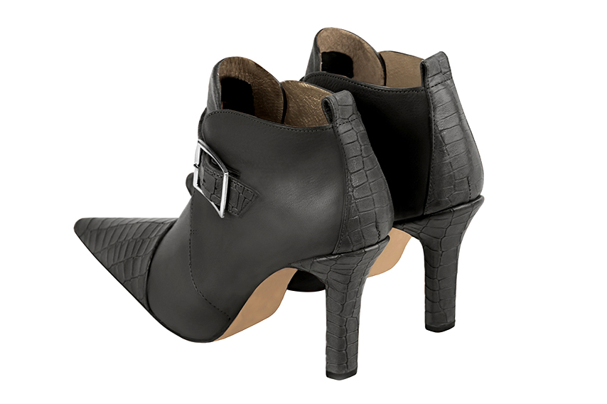 Women's dark grey elegant ankle boots, with buckles at the front. Pointed toe. High slim heel - Rear view